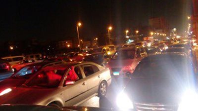 توقف حركة المرور أعلى دائرى المنيب بسبب تصادم مقطورة بسيارة ملاكى