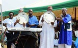 بالصور.. وزير ثقافة روندا يكرم فرقة توشكي التلقائية