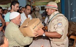 القوات المسلحة توزع حصصاً غذائية بمناسبة عيد الأضحي