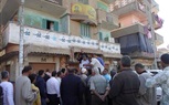 بالصور.. توزيع سكر وزيت بأسعار مخفضة بمدينة الباجور